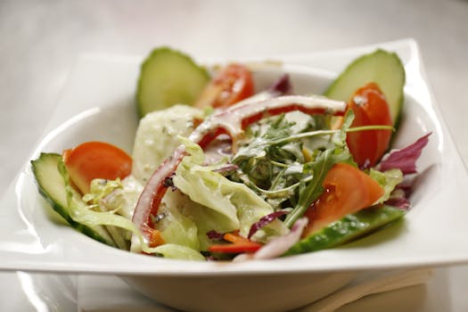 fresh leafy greens in a salad bowl