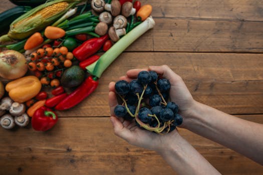 colorful fruits and vegetables on a wooden table