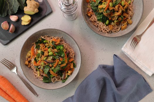 bowl of colorful stir-fried vegetables with grains