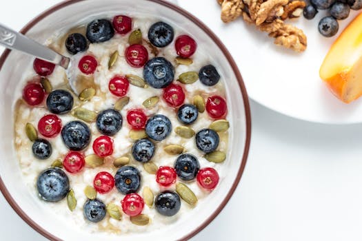 a bowl of oatmeal topped with fruits