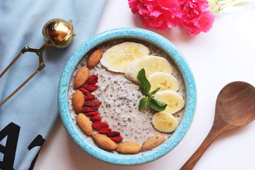 bowl of oatmeal topped with fruits and nuts