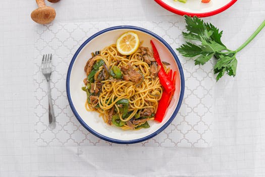 plate of whole grain pasta with vegetables