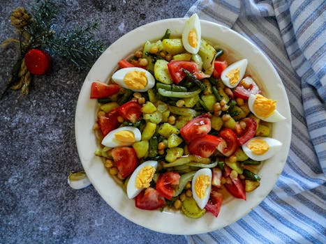 A colorful salad with fresh vegetables and chickpeas